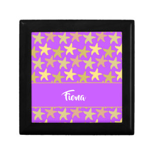 Colorful starfish on purple gift box