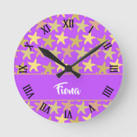 Colorful starfish on purple round clock