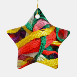 Colorful strands of yarn ceramic ornament