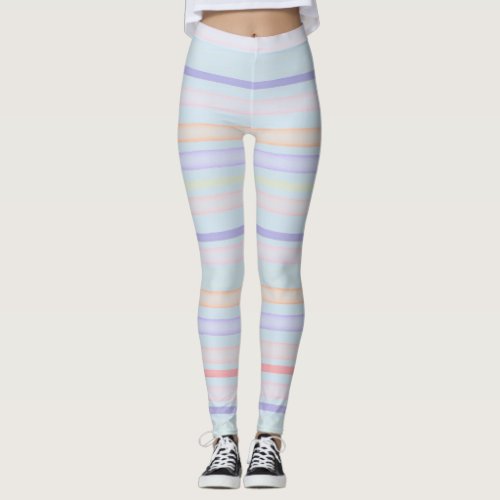 Colorful stripes on pastel blue leggings