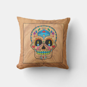 Colorful sugar skull on brown wood background outdoor pillow