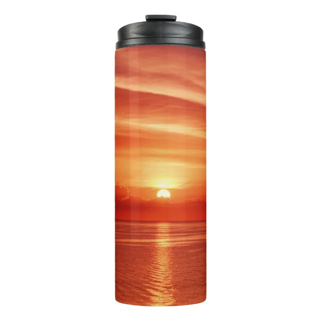 Colorful sunrise at sea, dramatic clouds. thermal tumbler (Front)