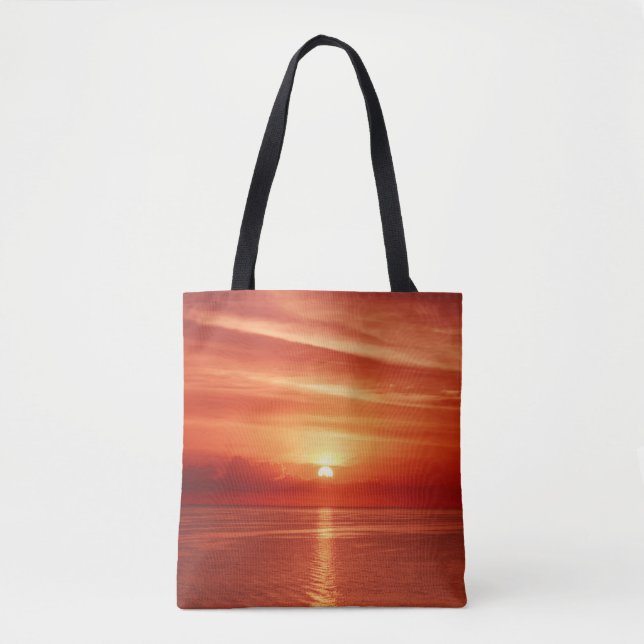 Colorful sunrise at sea, dramatic clouds. tote bag (Front)