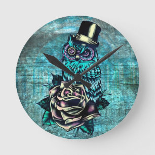 Colorful textured owl illustration on teal base. round clock