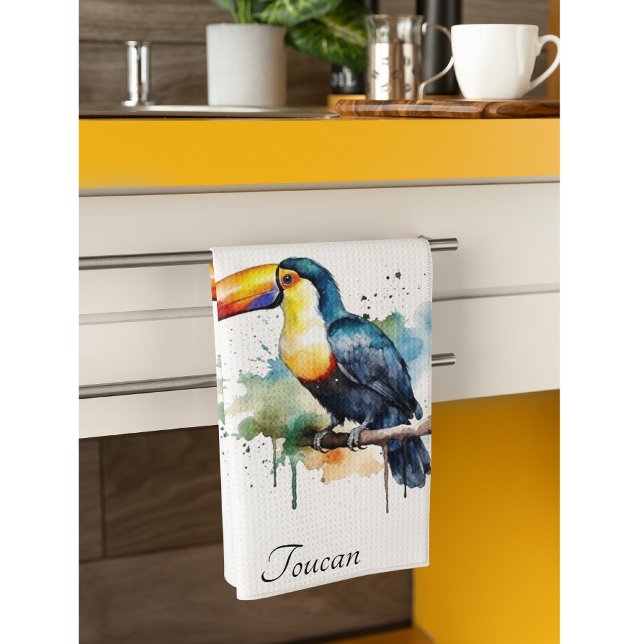 colorful toucan sitting on a  branch kitchen towel (Creator Uploaded)