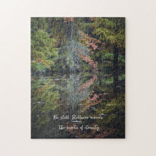 Colorful trees reflecting upon the calm water jigsaw puzzle