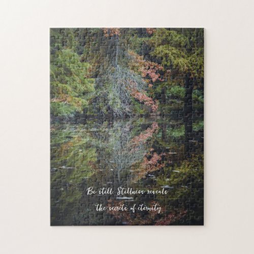 Colorful trees reflecting upon the calm water jigsaw puzzle