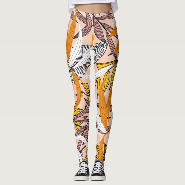 Colorful tropical leaves, beige background pattern leggings (Front)