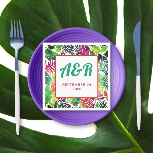 Colorful tropical leaves frame maximalist wedding napkins