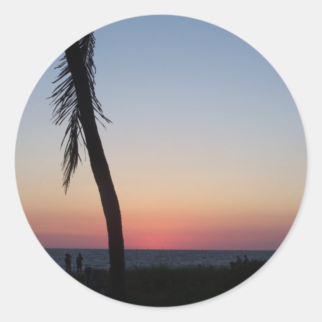 Colorful tropical sunset on a classic round sticker (Front)