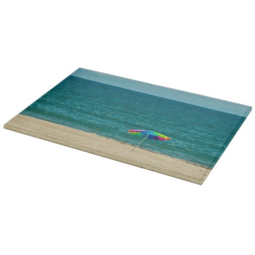 Colorful Umbrella On Beach Glass Cutting Board