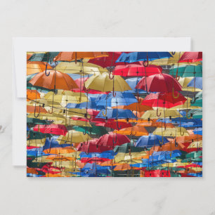 Colorful umbrellas in the sky blue orange red invitation
