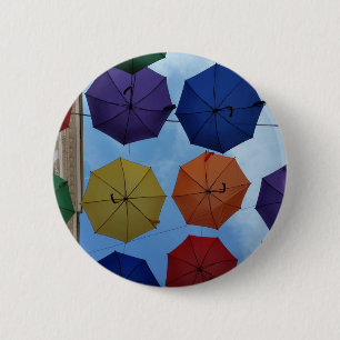Colorful umbrellas pinback button