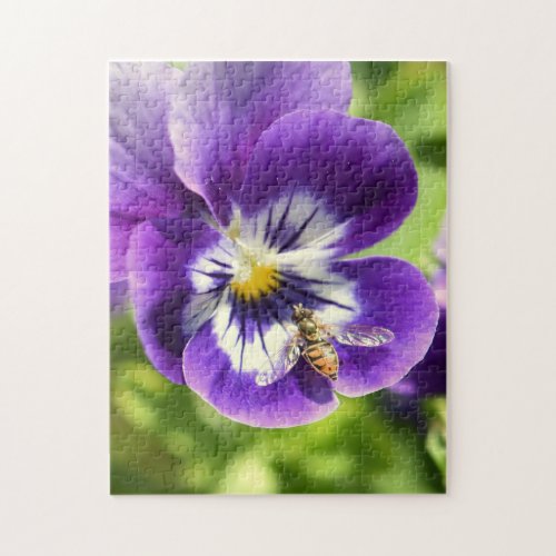 Colorful Violet flower with a bee spreading wings  Jigsaw Puzzle