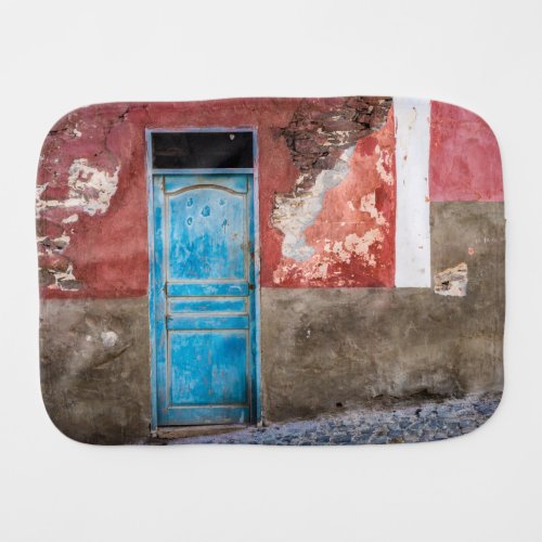 Colorful wall with blue door baby burp cloth