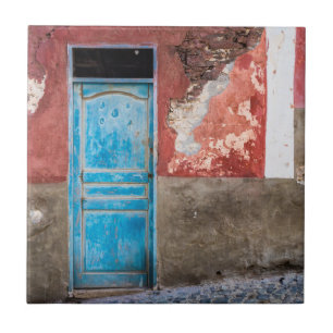 Colorful wall with blue door ceramic tile