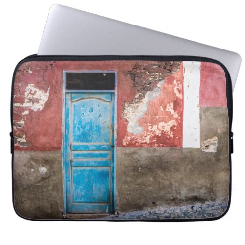 Colorful wall with blue door laptop sleeve