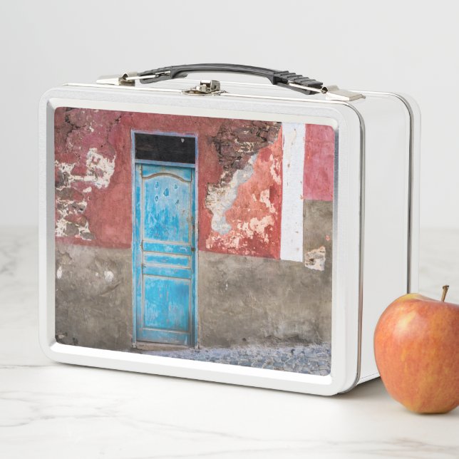 Colorful wall with blue door metal lunch box (In Situ)
