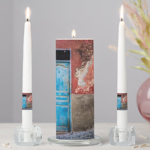 Colorful wall with blue door unity candle set