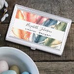 Colorful Watercolor Feathers Black Script Name Business Card Case<br><div class="desc">Make a lasting impression with this Colorful Watercolor Feathers Black Script Name Business Card Case! The vibrant design features a stylish watercolor feather pattern in shades of green, blue, pink, orange, and purple on a clean white background. Personalize the white stripe with your name and profession in elegant black script...</div>