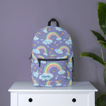 Colorful Watercolor Rainbow Confetti Purple Printed Backpack<br><div class="desc">Fun, colorful, and whimsical rainbow backpack. Our design features a beautiful watercolor rainbow and clouds illustration with colorful confetti, and a raindrop polka dot pattern in faux gold foil accents to add a magical look. Colorful palette of pink, blue, teal, lime, orange and purple. Customize with your name. Original artwork...</div>