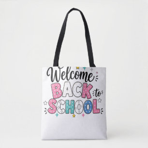 Colorful welcome back to school text with decorati tote bag