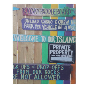 Colorful Welcome Island sign Carribean