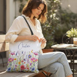 Colorful Wildflower Floral Personalized Name Tote Bag<br><div class="desc">Colorful Wildflower Floral Personalized Name Tote Bags features your custom personalized name in modern calligraphy script typography. Perfect for school,  work,  sports and home. Give a personalized gift for Christmas,  birthday,  holidays,  Mothers' Day to mom,  sister,  best friends,  teachers and more. Designed by Evco Studio www.zazzle.com/store/evcostudio</div>