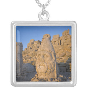 Colossal head statues of Gods guarding the Silver Plated Necklace