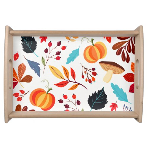 Colourful fall berries leaves and pumpkins serving tray