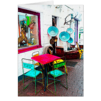 Colourful table and chairs in the alley way cards