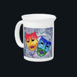 Comedy and Tragedy Pitcher<br><div class="desc">Comedy and Tragedy Theater Masks, designed and hand drawn by Sandra Gale. This original drawing is colorful and whimsical and looks great on any product. Can be given as a gift to the actor you know, or as a lovely colorful decoration. Happy and Sad faces with coordinated colors represent the...</div>