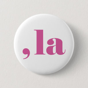 Comma la, Kamala Harris. Button