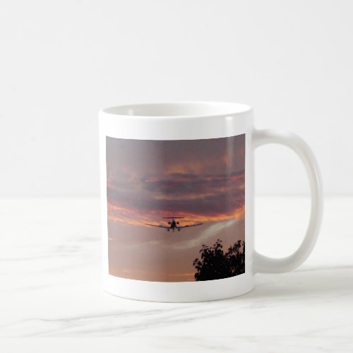 Commercial Jet Landing At Sunset Coffee Mug