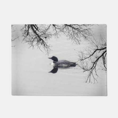 Common Loon Swims in a Northern Lake in Winter Doormat