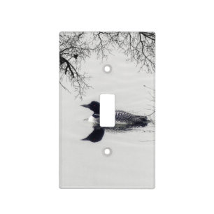Common Loon Swims in a Northern Lake in Winter Light Switch Cover