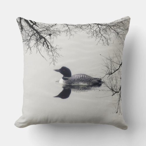 Common Loon Swims in a Northern Lake in Winter Throw Pillow