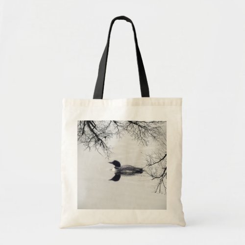 Common Loon Swims in a Northern Lake in Winter Tote Bag