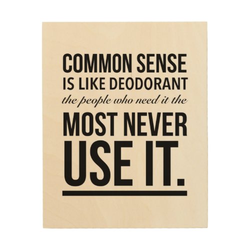 Common sense is like deodorant the people who nee wood wall art