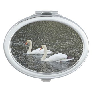 COMPACT, WHITE SWANS SIDE BY SIDE