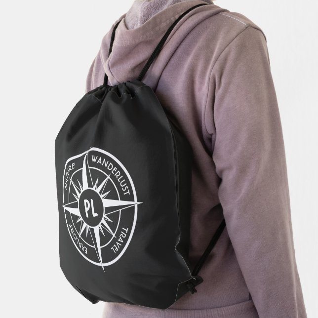 Compass star emblem monogram black and white drawstring bag (Insitu)