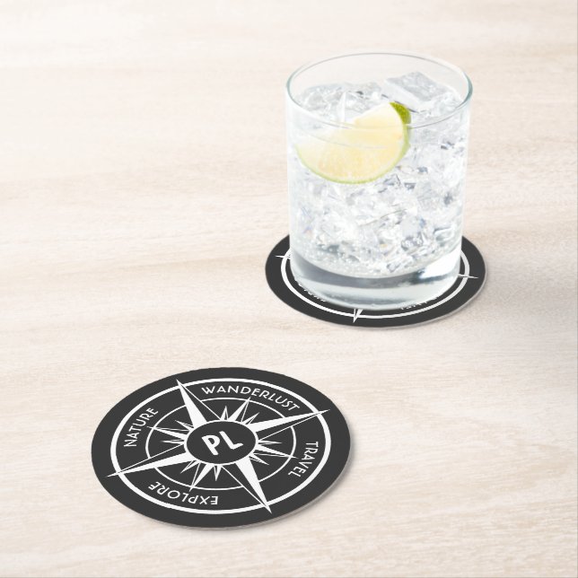 Compass star emblem monogram black and white round paper coaster (Insitu)