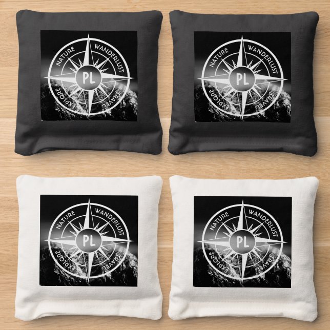 Compass star emblem monogram dramatic mountains cornhole bags (Wood)