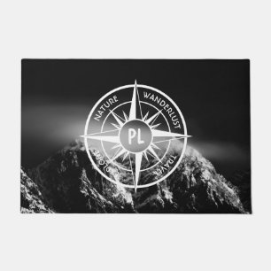 Compass star emblem monogram dramatic mountains doormat
