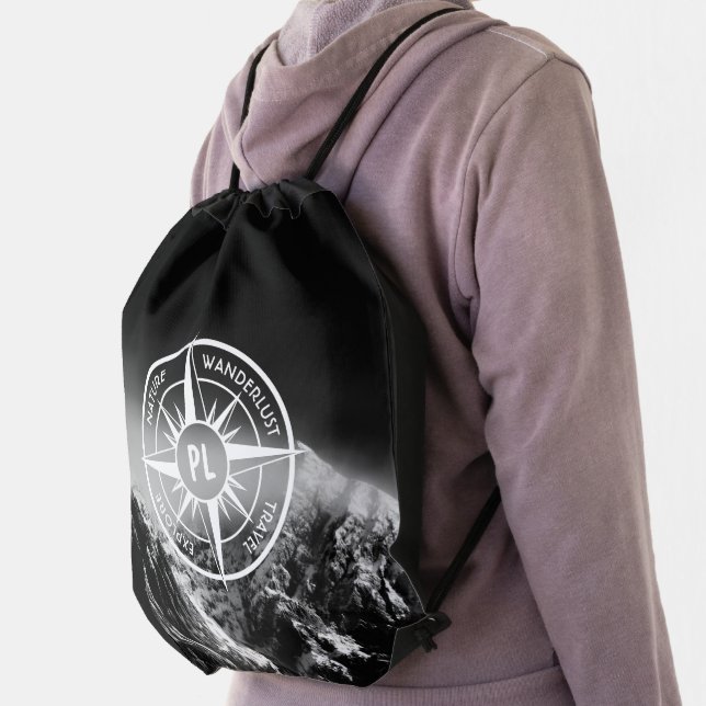 Compass star emblem monogram dramatic mountains drawstring bag (Insitu)