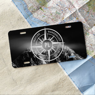 Compass star emblem monogram dramatic mountains license plate
