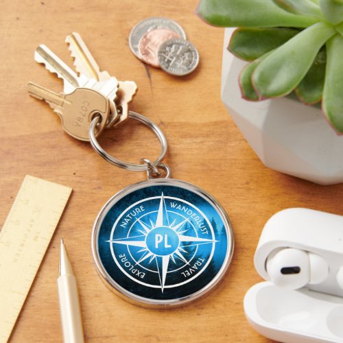 Compass star emblem monogram fog in spruce forest keychain