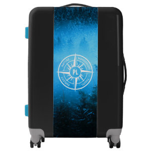 Compass star emblem monogram fog in spruce forest luggage
