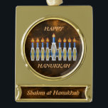 Completely Customizable Shalom Hanukkah Menorah Gold Plated Banner Ornament<br><div class="desc">This striking ornament has all the makings of a Chanukah keepsake any way it is customized: the stylized menorah with the Hebrew characters in the candles' flames; the phrases, "Happy Hanukkah" and "Shalom at Hanukkah"; the warm backgrounds of brown with peach-colored nebulae, both in the central circular cutout and the...</div>