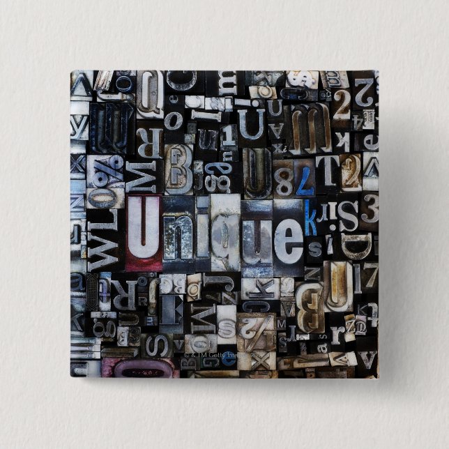 Composition of letterpress blocks button (Front)